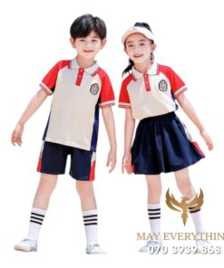 Đồng phục học sinh màu kem viền cam in logo trường